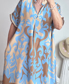 Robe fluide arabesque bleu ciel TU 40/48