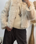 Blouson fausse fourrure beige