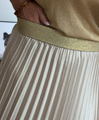 Jupe plissée beige dorée