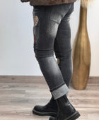 Jeans noir délavé multi patchs cœurs