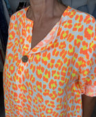 Blouse Léo orange et jaune jolie forme