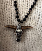 Pendentif tête de buffle noir artisanal