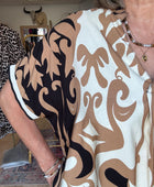 Robe fluide arabesque beige TU 40/48