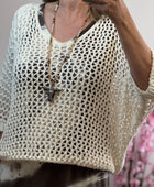 Pull ajouré crème