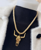 Collier cordelette dorée tête de buffle