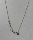 Collier Arbre de Vie Doré – Pierres Turquoises et Pendentifs Symboliques