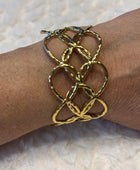 Bracelet manchette cœurs dorés