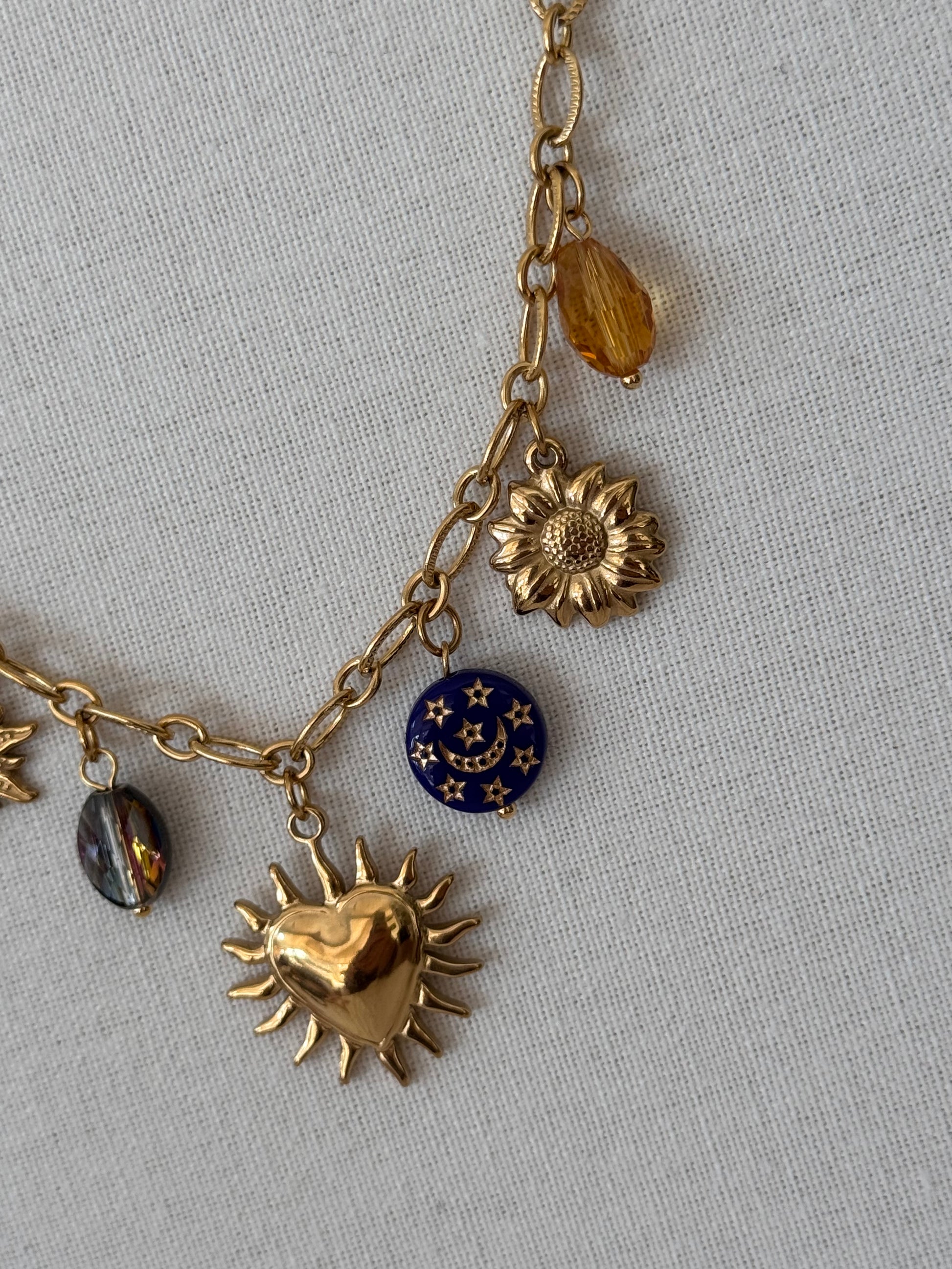 Parure collier et bracelet breloques bleues