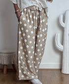 Pantalon à pois beige jolie forme TU 44/50