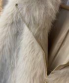 Blouson fausse fourrure beige