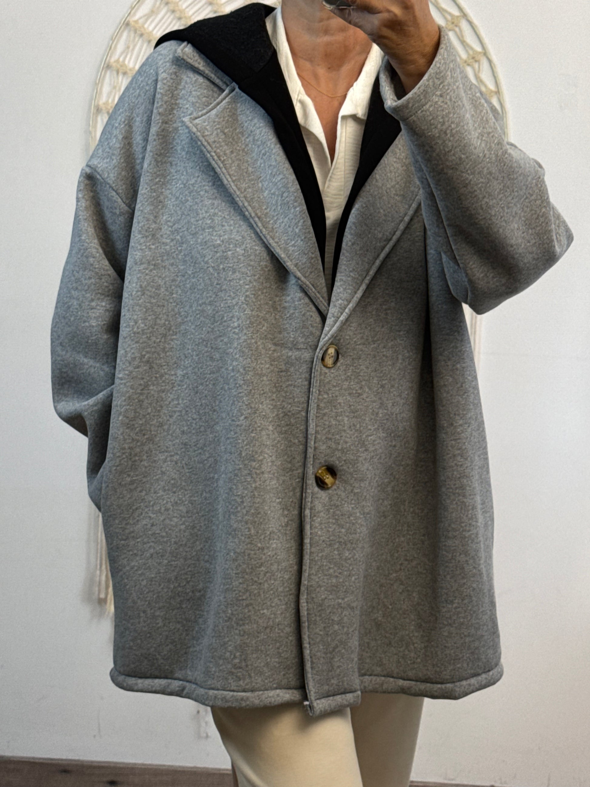 Veste molletonnée grise capuche noire TU 44/50