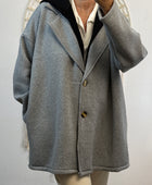 Veste molletonnée grise capuche noire TU 44/50