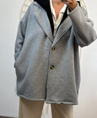 Veste molletonnée grise capuche noire TU 44/50