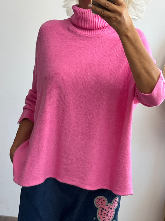 Pull col roulé rose vif