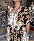 Robe fluide arabesque beige TU 40/48