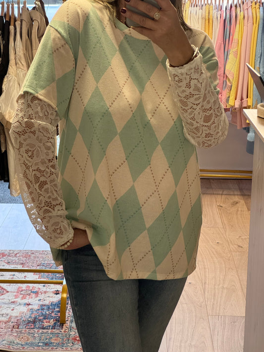 Pull jacquard vert manches dentelles