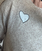 Pull coeur beige chiné