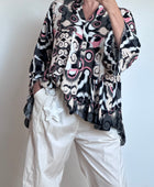 Blouse camélia noire et rose