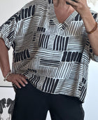 Blouse fluide imprimée noire TU 38/48
