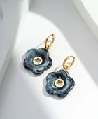Boucle d’oreille fleur pétale