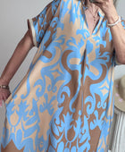 Robe fluide arabesque bleu ciel TU 40/48
