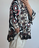 Blouse camélia noire et rose