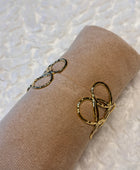 Bracelet manchette cœurs dorés