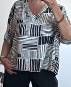 Blouse fluide imprimée noire TU 38/48
