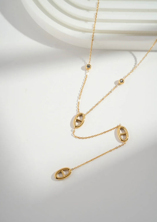 Collier Doré Motif
Ovale Pierres