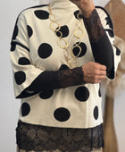 Pull crème pois noirs