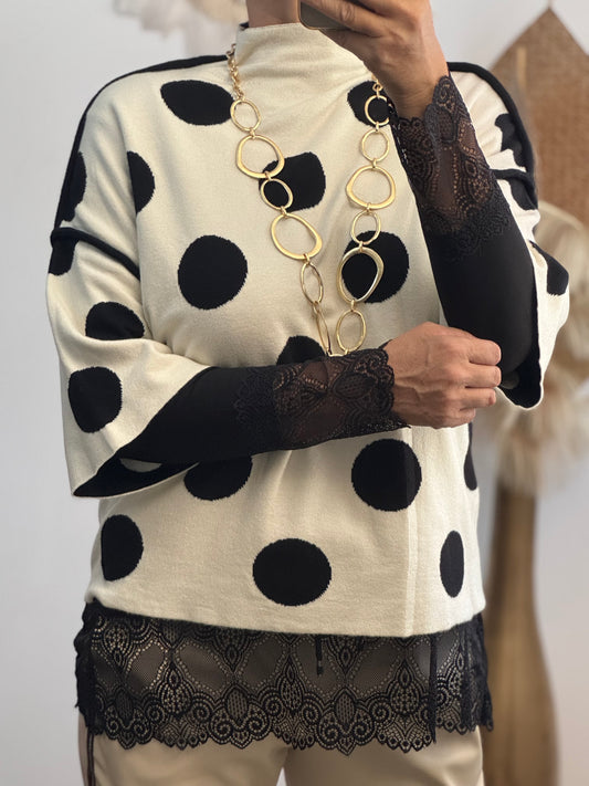 Pull crème pois noirs