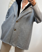 Veste molletonnée grise capuche noire TU 44/50