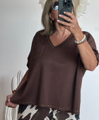 Pull marron rivets
