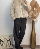 Blouson fausse fourrure beige