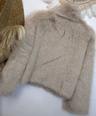 Blouson fausse fourrure beige