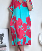 Robe florale turquoise /rouge TU 40/48