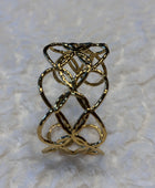 Bracelet manchette cœurs dorés