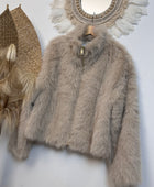Blouson fausse fourrure beige