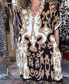 Robe fluide arabesque beige TU 40/48