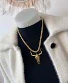 Collier cordelette dorée tête de buffle