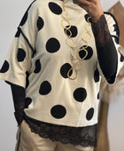 Pull crème pois noirs