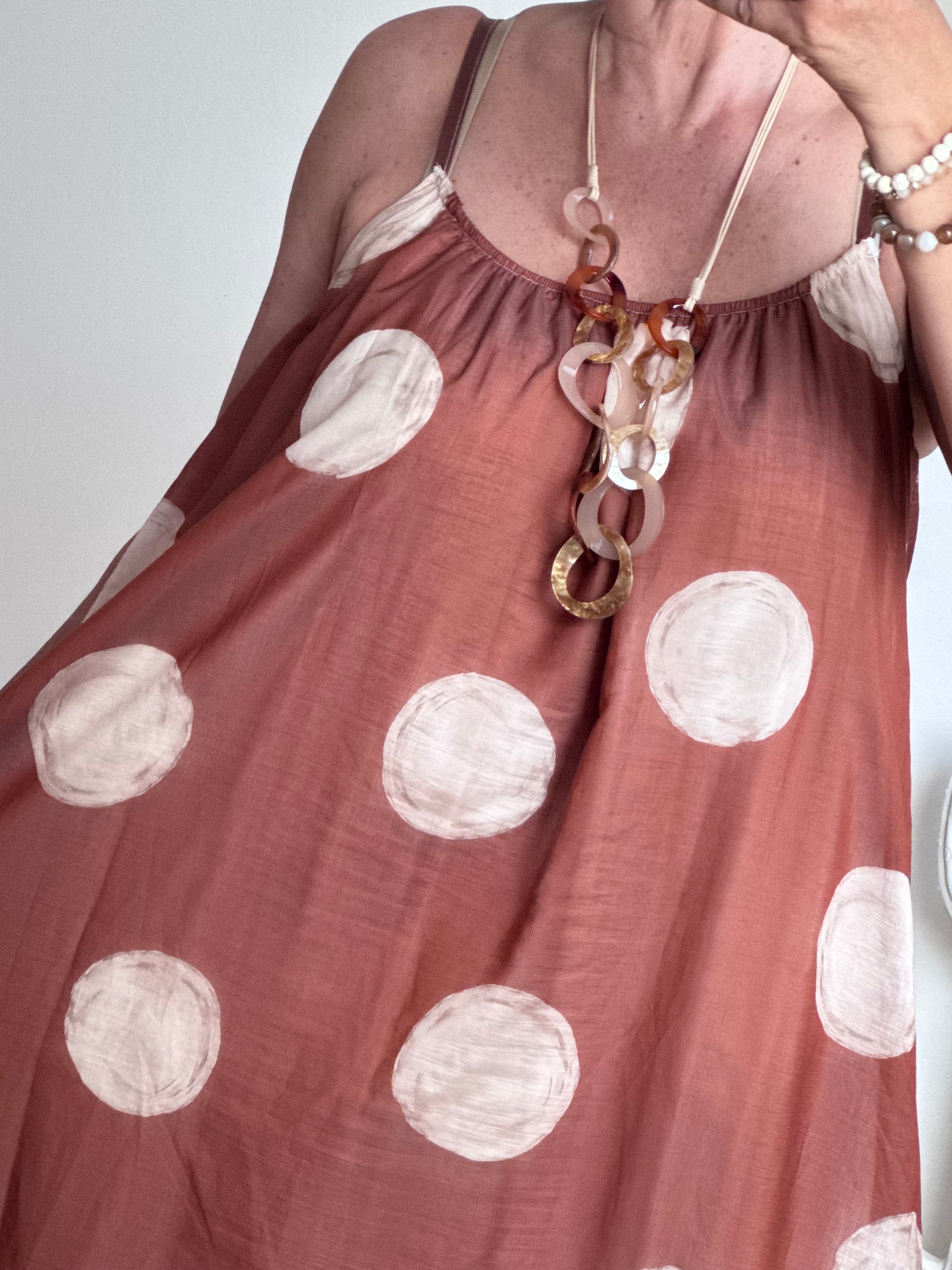 Robe à pois fond terracotta