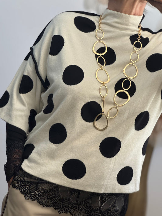 Pull crème pois noirs