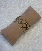 Bracelet manchette cœurs dorés