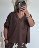 Pull marron rivets