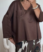 Pull marron rivets