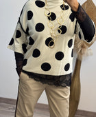 Pull crème pois noirs