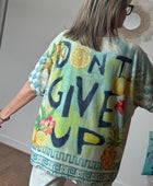 Haut oversize Don’t give up