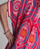 Robe fluide fond rouge