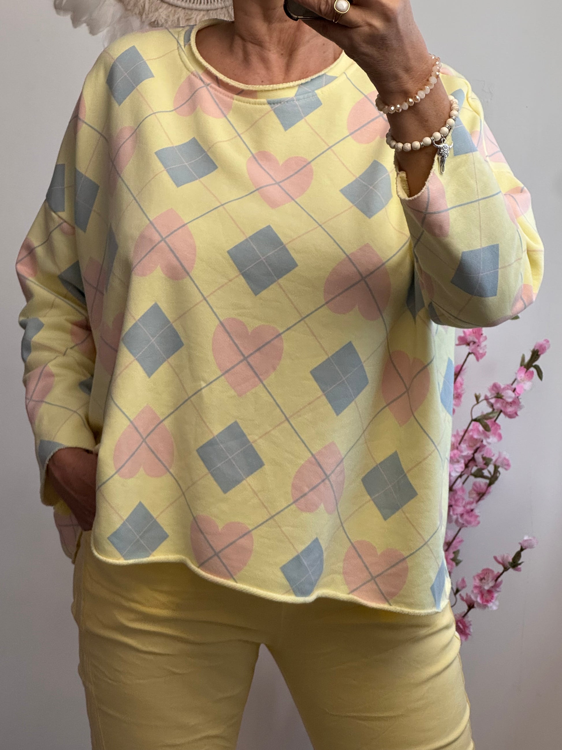 Sweat-shirt jacquard et cœur jaune